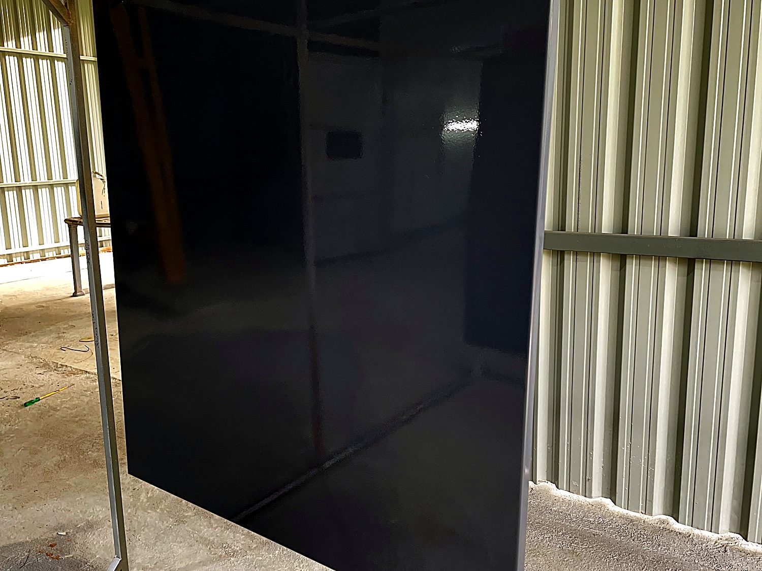 High-gloss charcoal coated panel