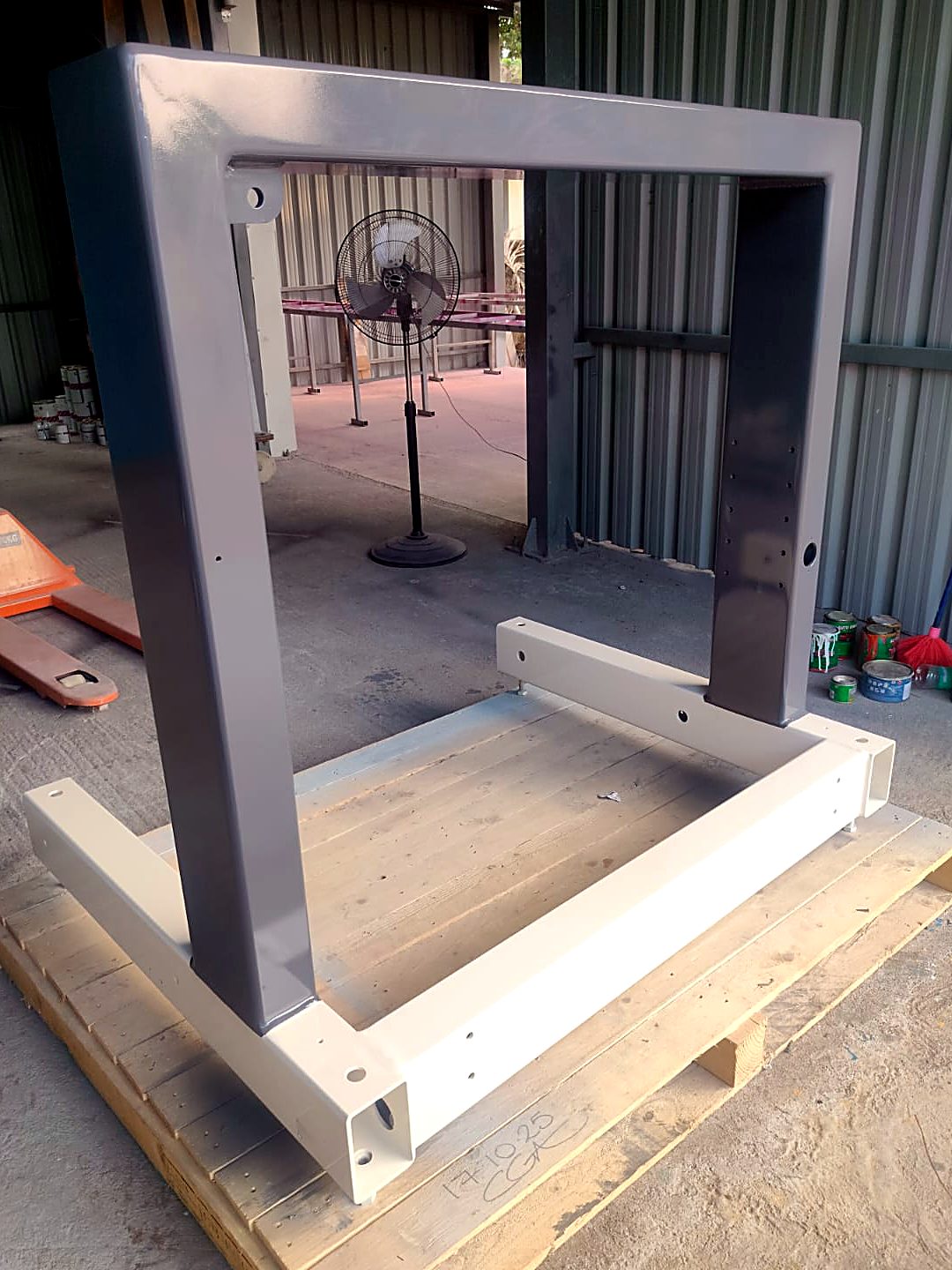 Two-tone masked machine frame